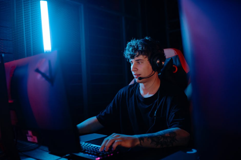 Professional gamer streaming in blue lighting